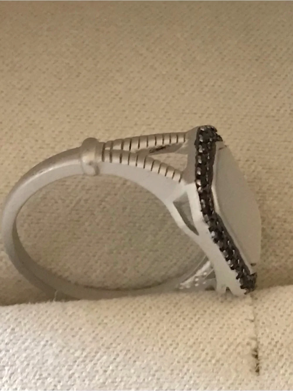 Freida Rothman 925 SS ring. MOP surrounded by Black CZ pave stones. Size 8